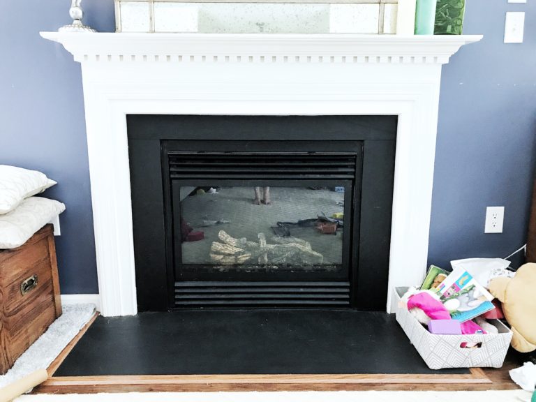 Upgrade your Fireplace Instantly with this DIY Faux Marble Fireplace Hack