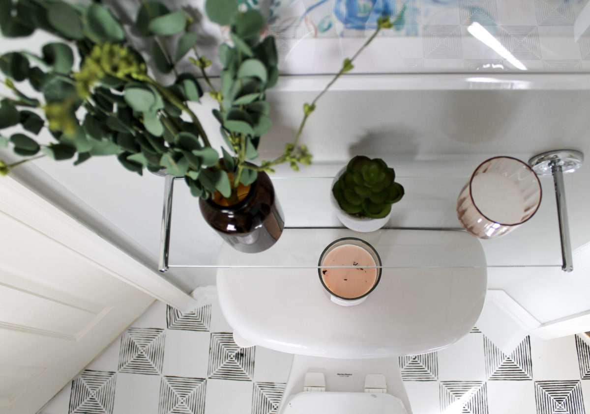 AFTER: Navy & Gold Budget Bathroom Makeover with Painted Vinyl Floors & Vanity