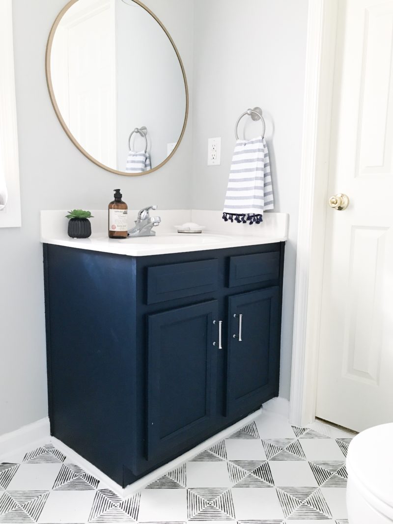 bathrooms with navy cabinets