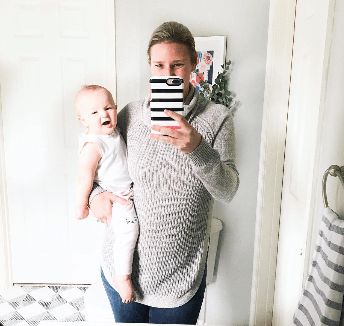 April Waltrip Interiors in Williamsburg, VA ABOUT ME
Photo of April holding baby in mirror selfie.