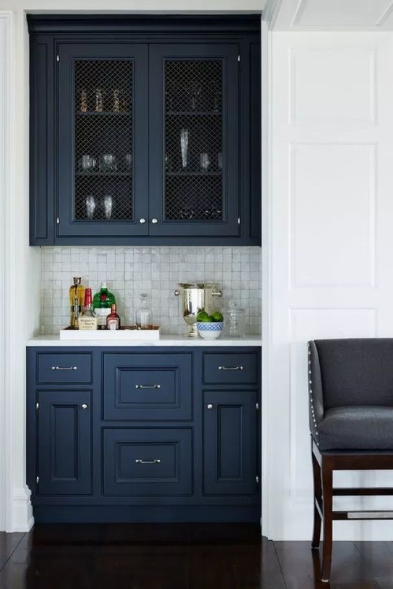 Sherwin Williams Blue Paint Colors Indigo Batik on painted cabinets with tile backsplash and white walls