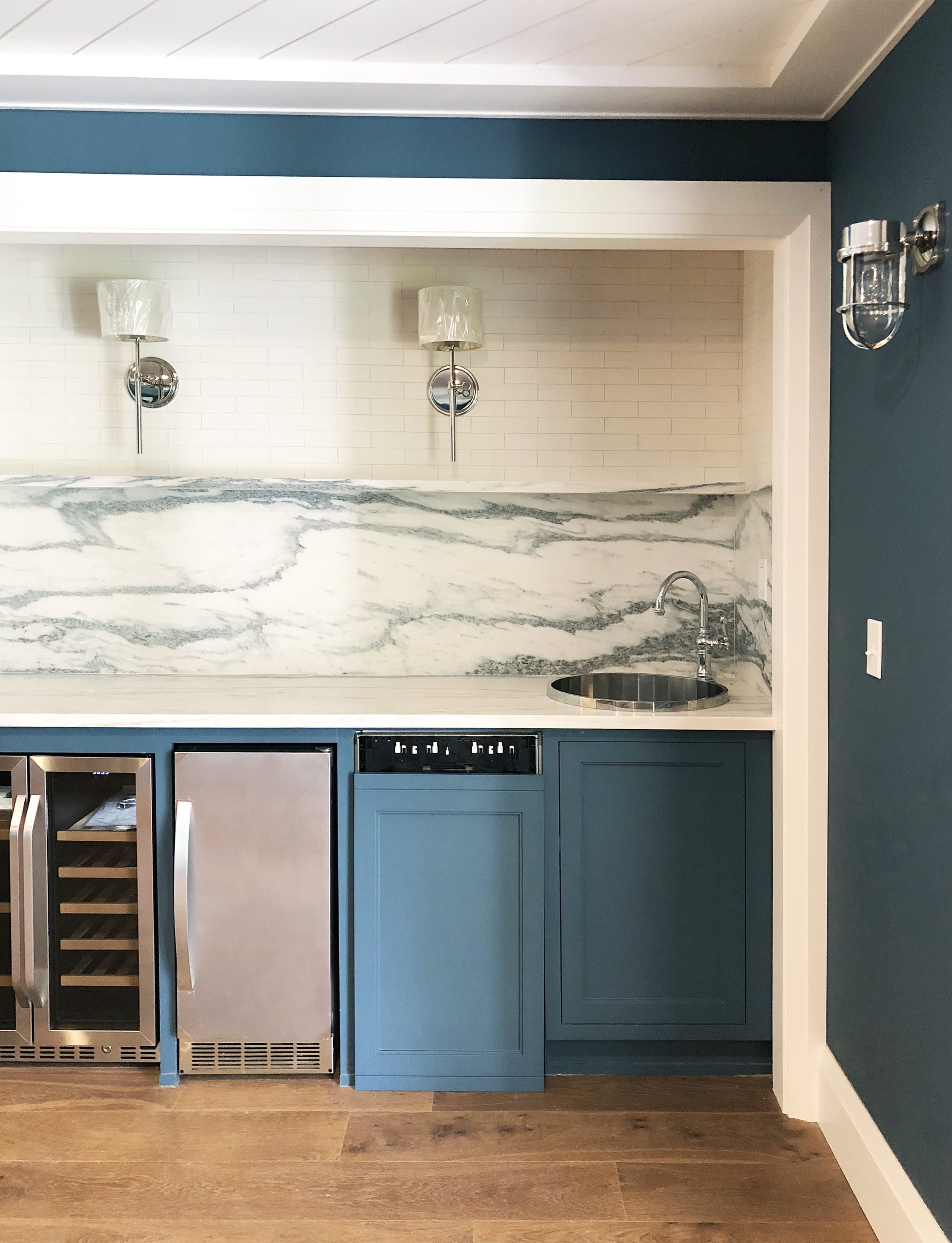 Sherwin Williams Blue Paint Colors: Waterloo in a media room wet bar, painted cabinets