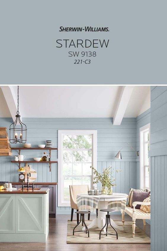 Sherwin Williams Stardew makes a great interior blue paint color in this kitchen or living room 