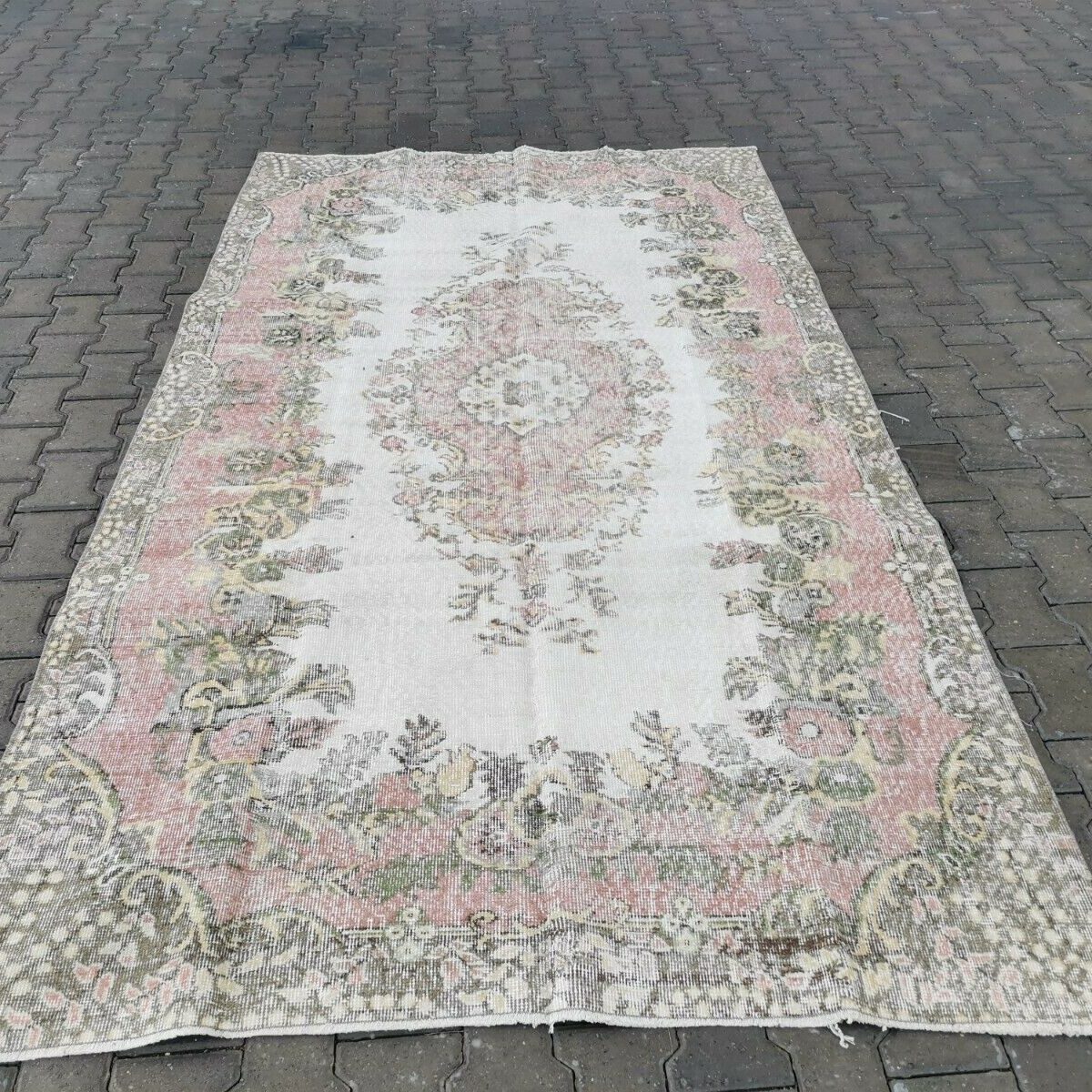 Gorgeous pink vintage Turkish rug on Ebay