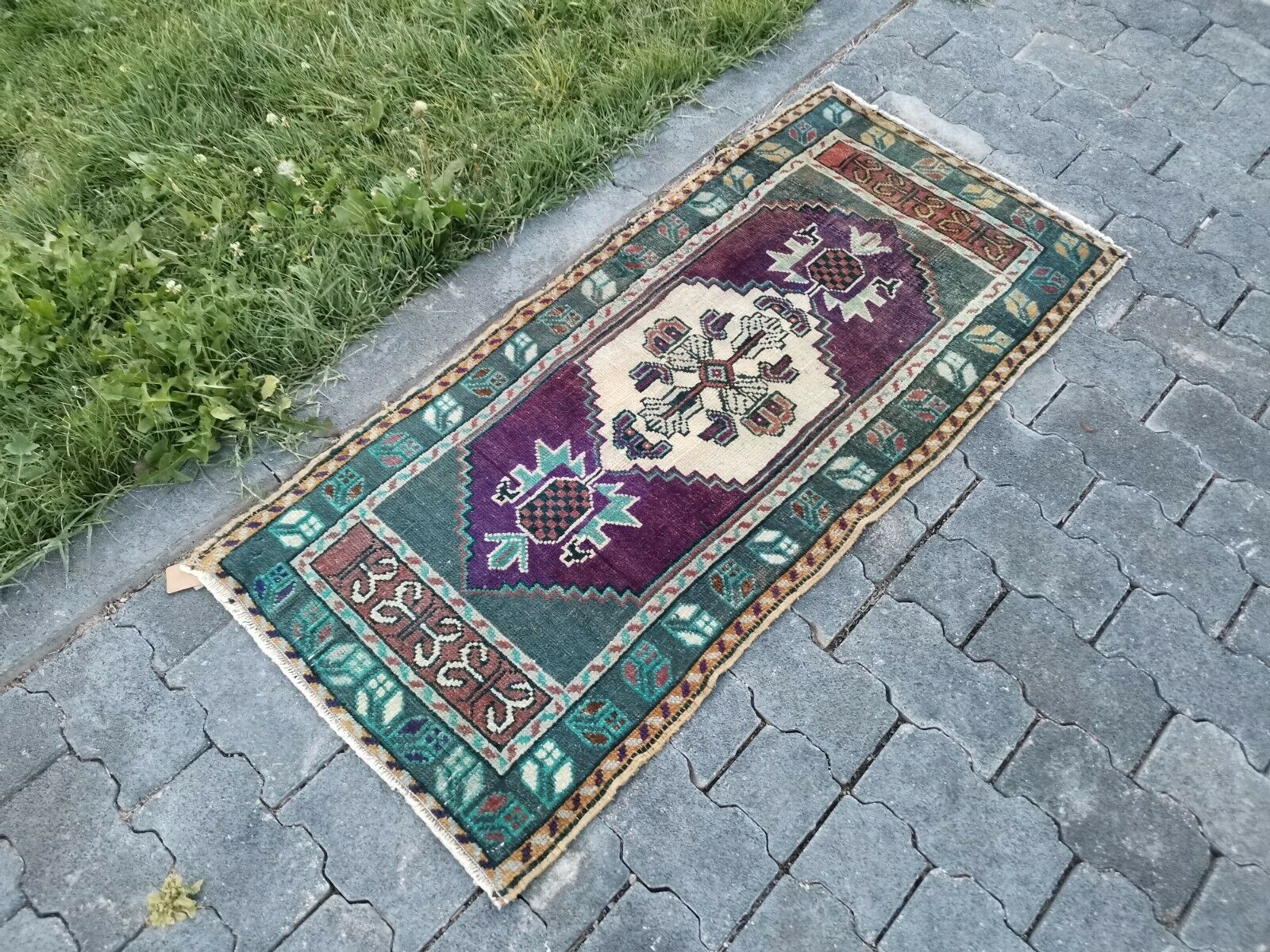 purple and emerald turkish rug