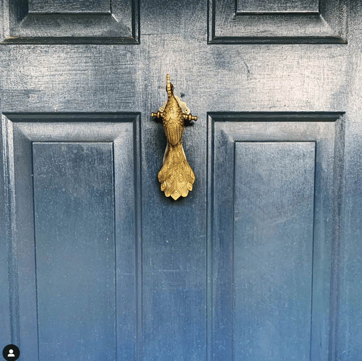 Peacock Door Knocker on Navy Blue front door