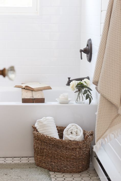 how to decorate a bathroom with towels in a basket