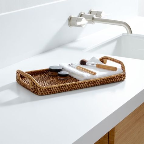 Store guest washcloths on the countertop tray.