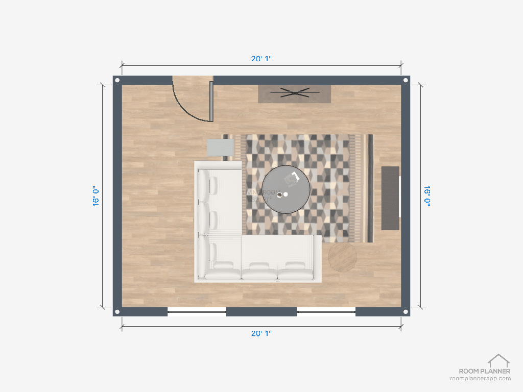 Sectional sofa layout with a round coffee table in the middle. 