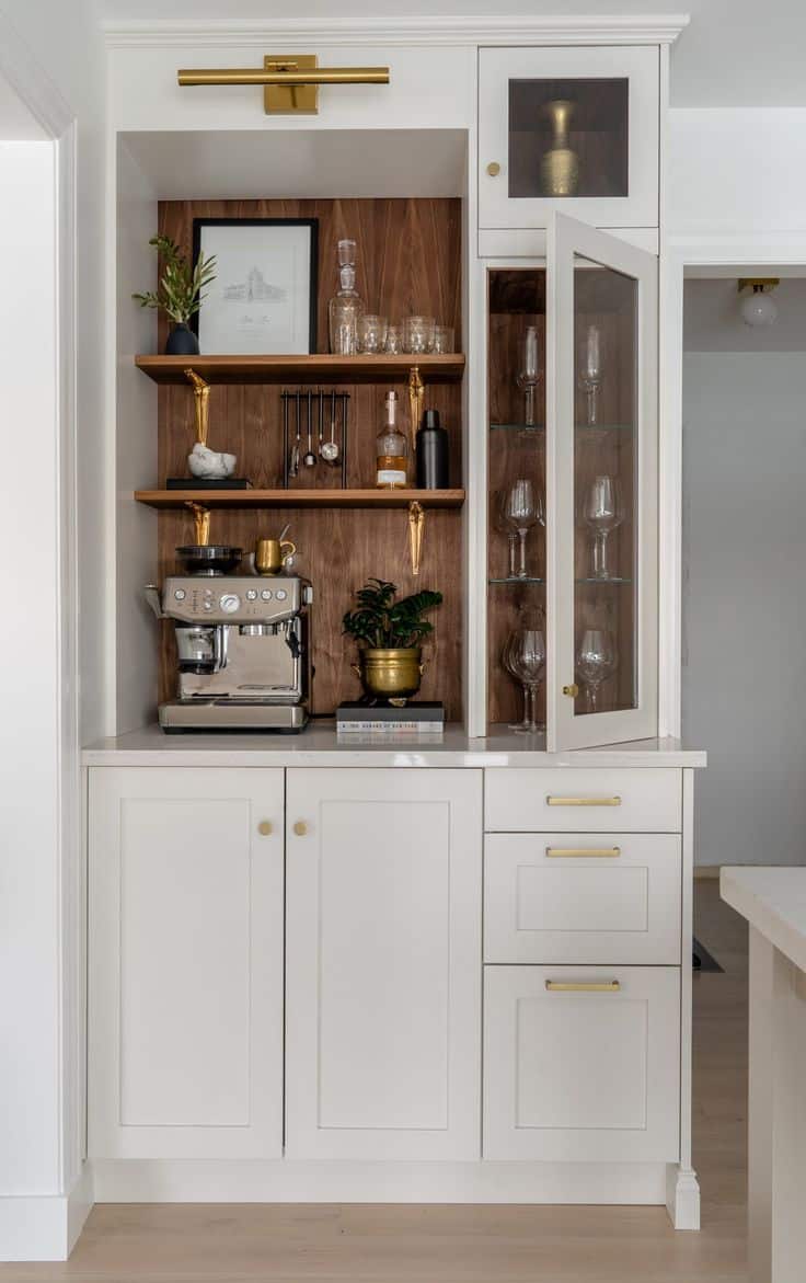 warm white built in coffee station with glass doors